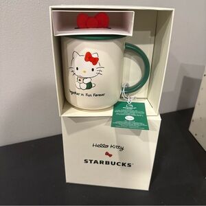 Starbucks Hello Kitty Mug with Green Handle and Red Bow Lid